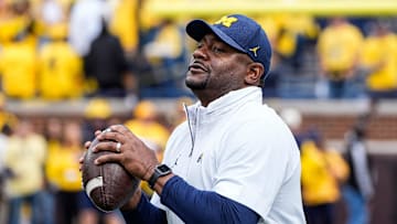 Sep 7, 2024; Ann Arbor, Michigan, USA; Michigan Offensive Pass Game Coordinator and wide receivers coach Ron Bellamy warms up with players before the game against Texas at Michigan Stadium. Mandatory Credit: Junfu Han-USA TODAY Network via Imagn Images