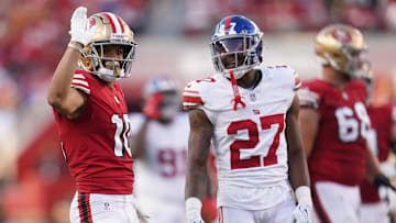 Sep 21, 2023; Santa Clara, California, USA; San Francisco 49ers wide receiver Ronnie Bell (10) gestures after making a catch for a first down in front of New York Giants safety Jason Pinnock (27) in the second quarter at Levi's Stadium. Mandatory Credit: Cary Edmondson-Imagn Images