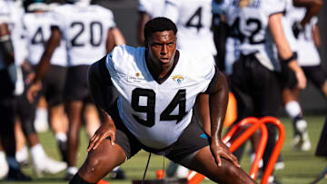 Jacksonville Jaguars defensive tackle Maason Smith (94) stretches during an NFL training camp seventh session at the Miller Electric Center, Thursday, July 31, 2025, in Jacksonville, Fla. [Doug Engle/Florida Times-Union]
