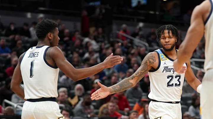 Mar 22, 2024; Indianapolis, IN, USA; Marquette Golden Eagles forward David Joplin (23) and guard Kam Jones (1) react in the second half against the Western Kentucky Hilltoppers in the first round of the 2024 NCAA Tournament at Gainbridge FieldHouse. Mandatory Credit: Robert Goddin-Imagn Images
