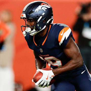 Sep 29, 2025; Denver, Colorado, USA;  Denver Broncos wide receiver Marvin Mims Jr. (19) runs after making a catch during the second quarter against the Cincinnati Bengals at Empower Field at Mile High. 