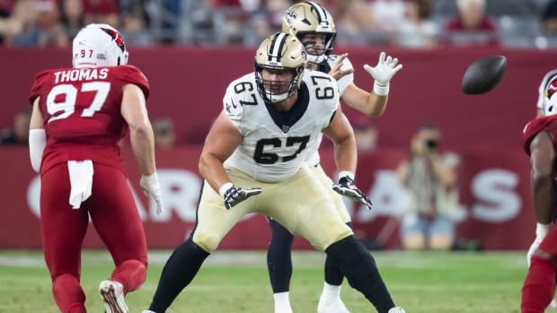 New Orleans Saints  offensive tackle Landon Young (67) blocks against the Arizona Cardinals 