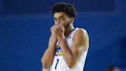 Delaware's Izaiah Pasha warms his hands as the Blue Hens get underway against Monmouth in the first half at the Bob Carpenter Center in Newark, Del., Saturday, Jan. 4, 2025.