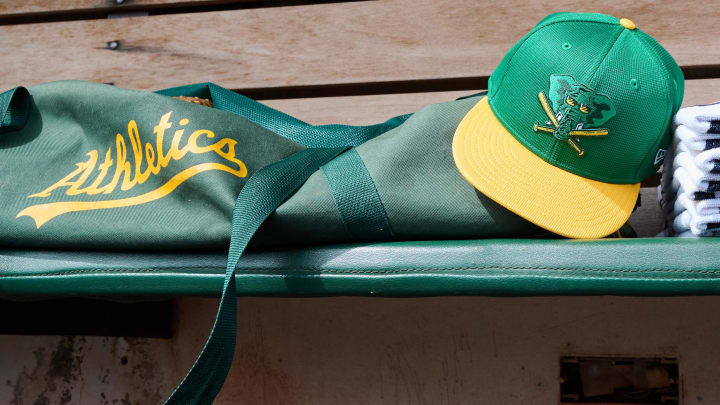 Apr 14, 2024; Oakland, California, USA; An Oakland Athletics baseball cap is seen in the dugout before the game between the Oakland Athletics and the Washington Nationals at Oakland-Alameda County Coliseum. Mandatory Credit: Robert Edwards-USA TODAY Sports