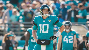 Dec 1, 2024; Jacksonville, Florida, USA; Jacksonville Jaguars quarterback Mac Jones (10) looks on during the second quarter against the Houston Texans at EverBank Stadium. Mandatory Credit: Jeremy Reper-Imagn Images