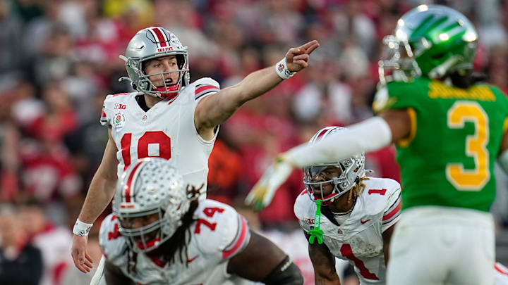 Ohio State Buckeyes quarterback Will Howard (18) motions during the second half of the College Football Playoff quarterfinal against the Oregon Ducks at the Rose Bowl in Pasadena, Calif. on Jan. 1, 2025. Ohio State won 41-21. Ohio State Buckeyes quarterback Will Howard (18) motions during the second half of the College Football Playoff quarterfinal against the Oregon Ducks at the Rose Bowl in Pasadena, Calif. on Jan. 1, 2025. Ohio State won 41-21.
