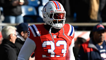 Dec 1, 2024; Foxborough, Massachusetts, USA; New England Patriots linebacker Anfernee Jennings (33) warms up before a game against the Indianapolis Colts at Gillette Stadium. Mandatory Credit: Eric Canha-Imagn Images