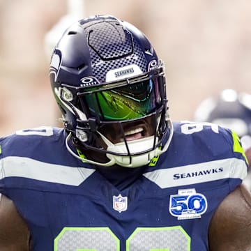 Sep 25, 2025; Glendale, Arizona, USA; Seattle Seahawks tackle Jarran Reed (90) reacts against the Arizona Cardinals at State Farm Stadium. Mandatory Credit: Mark J. Rebilas-Imagn Images