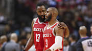 Mar 11, 2019; Houston, TX, USA; Houston Rockets guard James Harden (13) talks with guard Chris Paul (3) on the court during the third quarter against the Charlotte Hornets at Toyota Center. Mandatory Credit: Troy Taormina-Imagn Images
