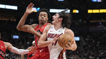 Dec 6, 2023; Toronto, Ontario, CAN; Miami Heat guard Jaime Jaquez Jr. (11) drives to the net against Scottie Barnes