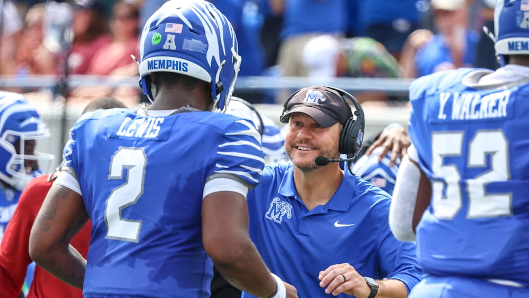 Sep 20, 2025; Memphis, Tennessee, USA; Memphis Tigers Head Coach Ryan Silverfield reacts after a touchdown during the first half against the Arkansas Razorbacks at Simmons Bank Liberty Stadium. Mandatory Credit: Wesley Hale-Imagn Images