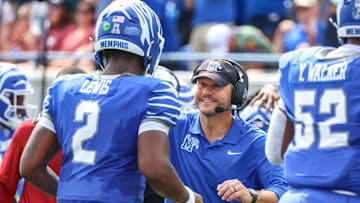 Sep 20, 2025; Memphis, Tennessee, USA; Memphis Tigers Head Coach Ryan Silverfield reacts after a touchdown during the first half against the Arkansas Razorbacks at Simmons Bank Liberty Stadium. Mandatory Credit: Wesley Hale-Imagn Images