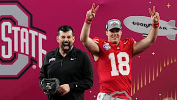 Ohio State Buckeyes head coach Ryan Day celebrates with quarterback Will Howard (18) following the 28-14 win over the Texas Longhorns in the Cotton Bowl Classic College Football Playoff semifinal game at AT&T Stadium in Arlington, Texas on Jan. 10, 2025.