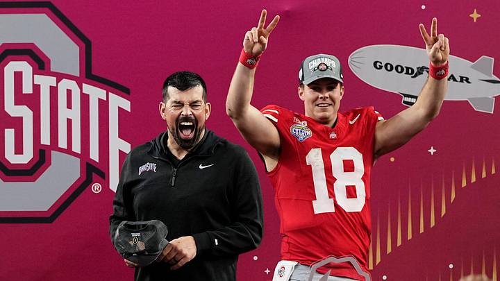 Ohio State Buckeyes head coach Ryan Day celebrates with quarterback Will Howard (18) following the 28-14 win over the Texas Longhorns in the Cotton Bowl Classic College Football Playoff semifinal game at AT&T Stadium in Arlington, Texas on Jan. 10, 2025.