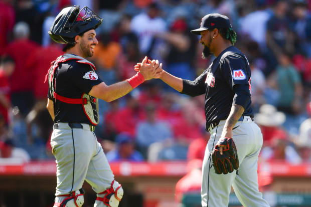 Austin Hedges celebrates with Emmanuel Clase