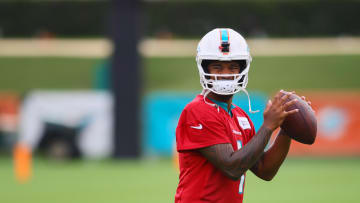 Jul 24, 2024; Miami Gardens, FL, USA; Miami Dolphins quarterback Tua Tagovailoa (1) throws the football during training camp at Baptist Health Training Complex.