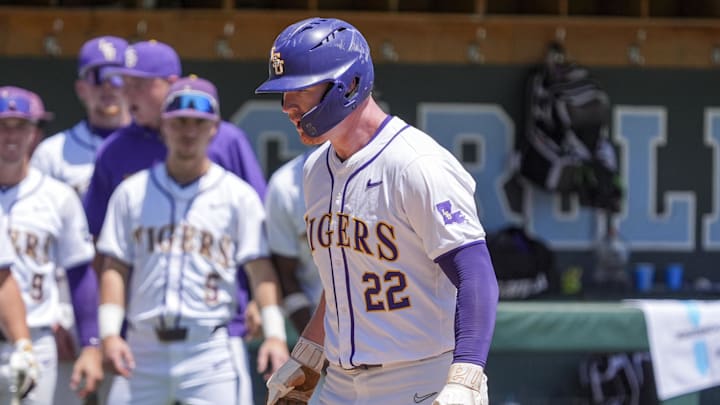 May 31, 2024; Chapel Hill, NC, USA; LSU first baseman Jared Jones (22) trots onto home plate after hitting the tying home run against the Wofford Terriers during the NCAA Regional in Chapel Hill. Mandatory Credit: Jim Dedmon-Imagn Images