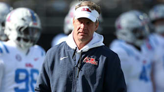 Nov 28, 2025; Starkville, Mississippi, USA; Mississippi Rebels head coach Lane Kiffin looks on before the game against the Mississippi State Bulldogs at Davis Wade Stadium at Scott Field. Mandatory Credit: Petre Thomas-Imagn Images
