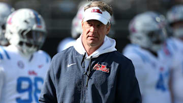 Nov 28, 2025; Starkville, Mississippi, USA; Mississippi Rebels head coach Lane Kiffin looks on before the game against the Mississippi State Bulldogs at Davis Wade Stadium at Scott Field. Mandatory Credit: Petre Thomas-Imagn Images