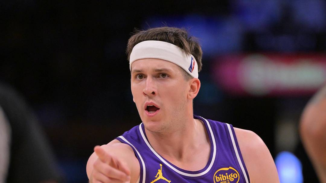 Feb 5, 2026; Los Angeles, California, USA;  Los Angeles Lakers guard Austin Reaves (15) reacts after a foul in the second half against the Philadelphia 76ers at Crypto.com Arena. Mandatory Credit: Jayne Kamin-Oncea-Imagn Images