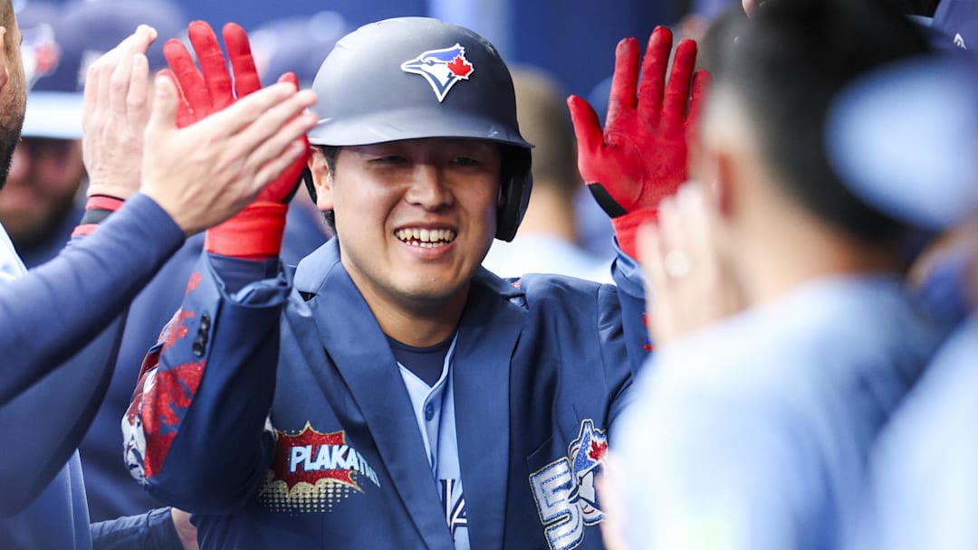 May 5, 2026; St. Petersburg, Florida, USA; Toronto Blue Jays third baseman Kazuma Okamoto (7) reacts in the dugout after hitting a solo home run against the Tampa Bay Rays in the first inning at Tropicana Field. Mandatory Credit: Nathan Ray Seebeck-Imagn Images