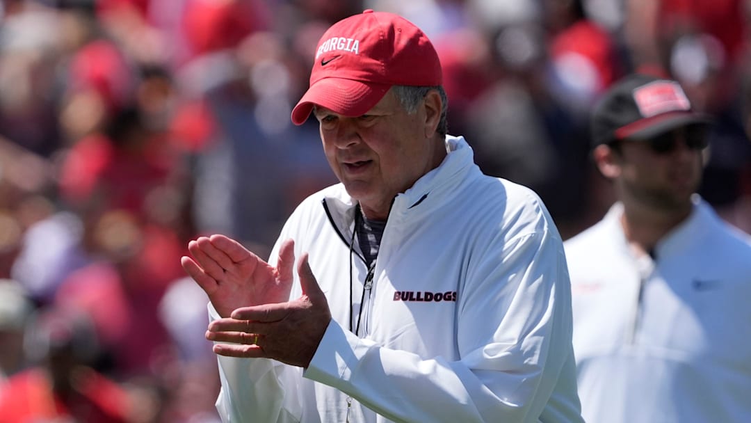 Georgia assistant coach and offensive line coach Stacy Searels works with his unit during warm ups before the start of the Georgia G-Day spring football game in Athens, Ga., on Saturday, April 12, 2025.