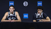 Sep 23, 2025; Brooklyn, NY, USA;  Brooklyn Nets guards Egor Demin (8) and Nolan Traore (88) speak at Media Day. Mandatory Credit: Wendell Cruz-Imagn Images