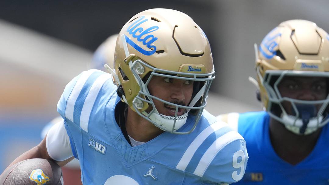 May 2, 2026; Pasadena, CA, USA; UCLA Bruins quarterback Nico Iamaleava (9) carries the ball during the spring game at Rose Bowl. Mandatory Credit: Kirby Lee-Imagn Images