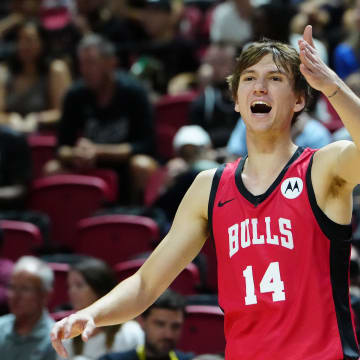 Jul 14, 2024; Las Vegas, NV, USA; Chicago Bulls forward Matas Buzelis (14) shouts at a teammate while playing against the Golden State Warriors during the first quarter at Thomas & Mack Center. Mandatory Credit: Stephen R. Sylvanie-USA TODAY Sports