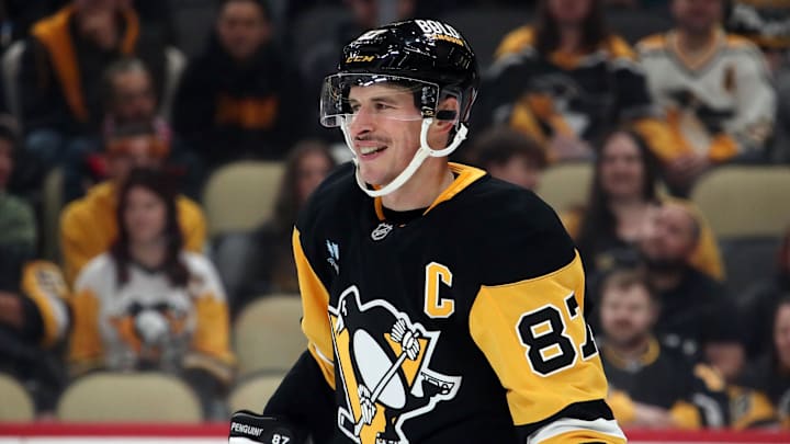 Oct 31, 2024; Pittsburgh, Pennsylvania, USA;  Pittsburgh Penguins center Sidney Crosby (87) reacts during the first period against the Anaheim Ducks at PPG Paints Arena. Mandatory Credit: Charles LeClaire-Imagn Images