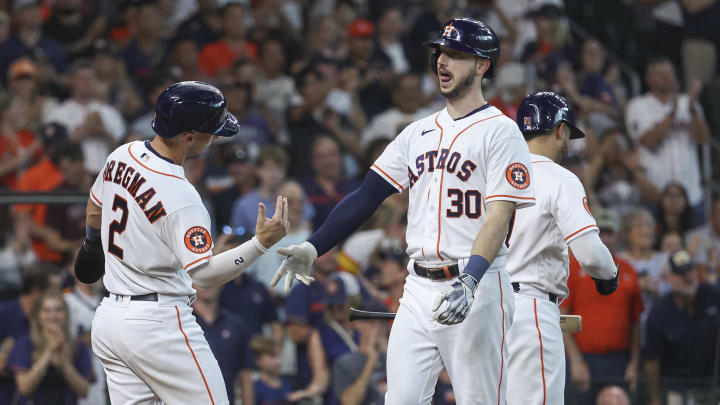 Aug 12, 2023; Houston, Texas, USA; Houston Astros right fielder Kyle Tucker (30) celebrates with third baseman Alex Bregman (2) after hitting a home run during the fourth inning against the Los Angeles Angels at Minute Maid Park.