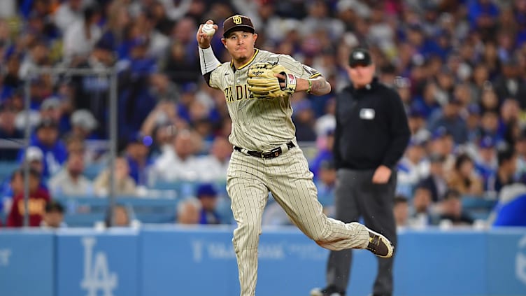 May 12, 2023; Los Angeles, California, USA; San Diego Padres third baseman Manny Machado (13) throws