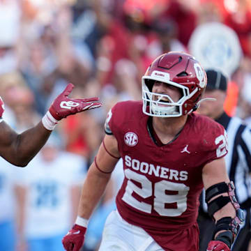 Oklahoma Sooners defensive lineman R Mason Thomas (32) celebrates beside Oklahoma Sooners linebacker Danny Stutsman (28) after a sacks during a college football game between the University of Oklahoma Sooners (OU) and the Tulane Green Wave at Gaylord Family - Oklahoma Memorial Stadium in Norman, Okla., Saturday, Sept. 14, 2024.