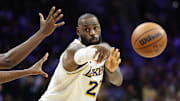 Dec 7, 2025; Philadelphia, Pennsylvania, USA; Los Angeles Lakers forward Lebron James (23) passes the ball against the Philadelphia 76ers during the fourth quarter at Xfinity Mobile Arena. Mandatory Credit: Bill Streicher-Imagn Images
