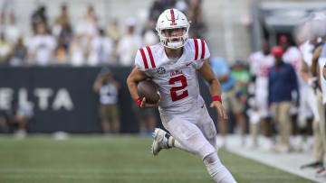 Sep 17, 2022; Atlanta, Georgia, USA; Mississippi Rebels quarterback Jaxson Dart (2) scrambles against the Georgia Tech Yellow Jackets in the second half at Bobby Dodd Stadium. Mandatory Credit: Brett Davis-USA TODAY Sports