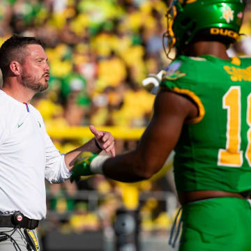 Oregon head coach Dan Lanning calls to players as the Oregon Ducks host the Idaho Vandals Saturday, Aug. 31, 2024 at Autzen Stadium in Eugene, Ore.