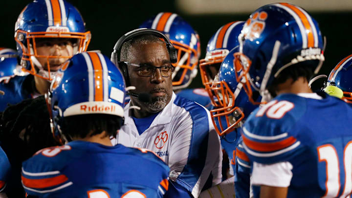 Cedar Shoals coach Leroy Ryals huddles up his team during a GHSA high school football game against North Hall in Athens, Ga., on Thursday, Oct. 26, 2023.