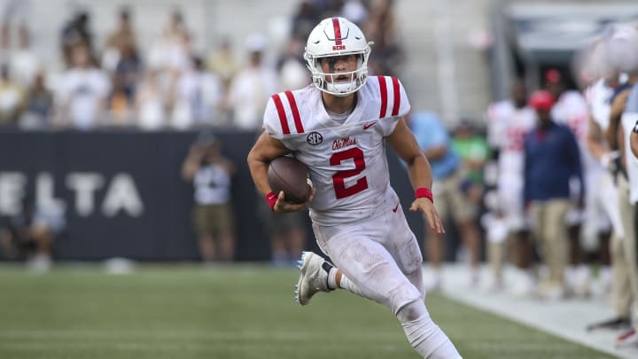 Sep 17, 2022; Atlanta, Georgia, USA; Mississippi Rebels quarterback Jaxson Dart (2) scrambles against the Georgia Tech Yellow Jackets in the second half at Bobby Dodd Stadium. Mandatory Credit: Brett Davis-USA TODAY Sports