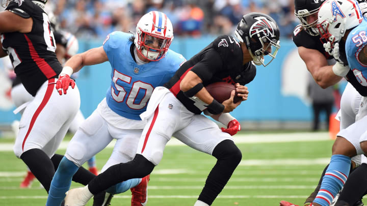 Oct 29, 2023; Nashville, Tennessee, USA; Atlanta Falcons quarterback Desmond Ridder (9) is sacked by Tennessee Titans linebacker Jack Gibbens (50) during the first half at Nissan Stadium. Mandatory Credit: Christopher Hanewinckel-USA TODAY Sports