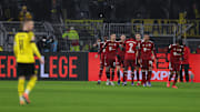 Bayern Munich celebrate a Klassiker victory that extends their lead atop the Bundesliga