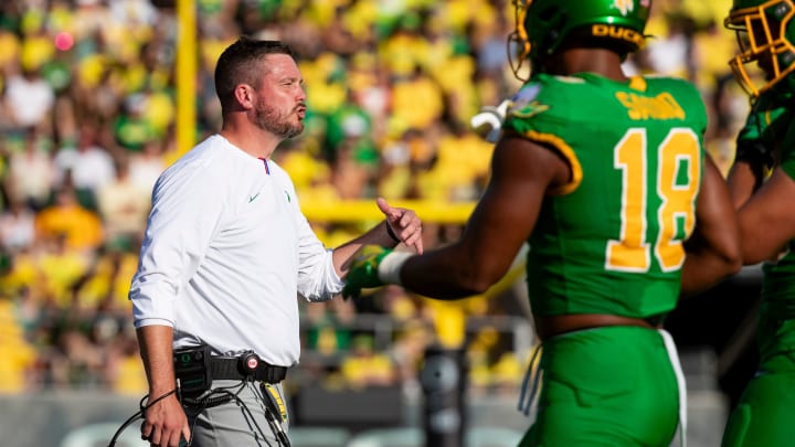 Oregon head coach Dan Lanning calls to players as the Oregon Ducks host the Idaho Vandals Saturday, Aug. 31, 2024 at Autzen Stadium in Eugene, Ore.