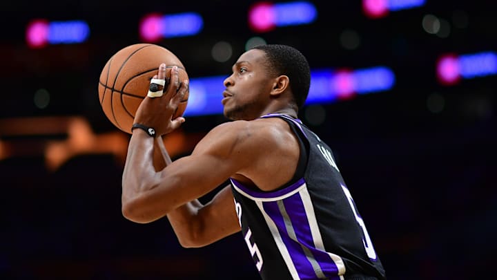 Dec 28, 2024; Los Angeles, California, USA; Sacramento Kings guard De'Aaron Fox (5) shoots against the Los Angeles Lakers during the first half at Crypto.com Arena. Mandatory Credit: Gary A. Vasquez-Imagn Images