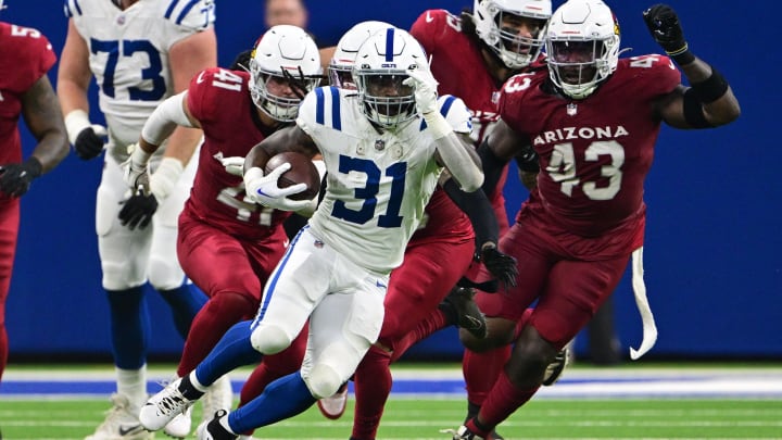 Aug 17, 2024; Indianapolis, Indiana, USA; Indianapolis Colts running back Tyler Goodson (31) runs against the Arizona Cardinals during the second quarter at Lucas Oil Stadium. Mandatory Credit: Marc Lebryk-USA TODAY Sports