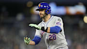 Sep 9, 2024; Toronto, Ontario, CAN; New York Mets designated hitter J.D. Martinez (28) reacts after his one run single against the Toronto Blue Jays during the fourth inning at Rogers Centre. Mandatory Credit: John E. Sokolowski-Imagn Images