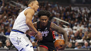 Oct 22, 2025; Orlando, Florida, USA; Miami Heat guard Davion Mitchell (45) controls the ball against the Orlando Magic in the first quarter at Kia Center. Mandatory Credit: Nathan Ray Seebeck-Imagn Images