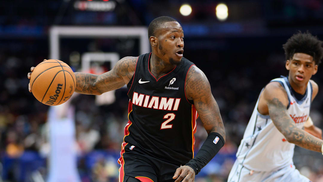 Mar 31, 2025; Washington, District of Columbia, USA; Miami Heat guard Terry Rozier (2) drives to the basket against Washington Wizards guard AJ Johnson (5) during the first quarter at Capital One Arena. Mandatory Credit: Reggie Hildred-Imagn Images