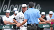 Vanderbilt baseball head coach Tim Corbin speaks with the umpire during a NCAA baseball game between the Tennessee Volunteers and Vanderbilt Commodores at Lindsey Nelson Stadium on May 11, 2025.