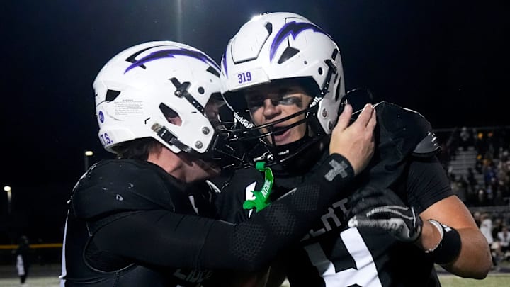 Iowa City Liberty’s Reece Rettig (17) and Iowa City Liberty’s Pryor Reiners (4) celebrate Nov. 7, 2025 after defeating Southeast Polk in an Iowa high school quarterfinal football game in North Liberty, Iowa. Iowa City Liberty’s Reece Rettig (17) and Iowa City Liberty’s Pryor Reiners (4) celebrate Nov. 7, 2025 after defeating Southeast Polk in an Iowa high school quarterfinal football game in North Liberty, Iowa.