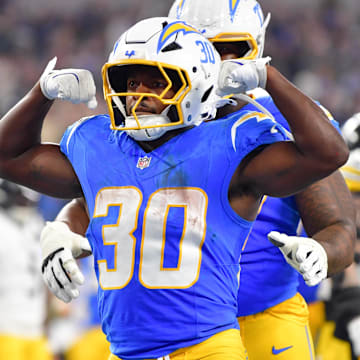 Nov 9, 2025; Inglewood, California, USA; Los Angeles Chargers running back Kimani Vidal (30) celebrates after scoring a touchdown against the Pittsburgh Steelers during the fourth quarter of the game at SoFi Stadium. Mandatory Credit: Gary A. Vasquez-Imagn Images