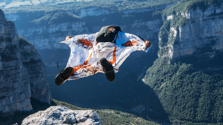 A BASE Jumper Leaving the Cliff